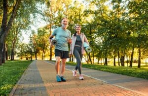 Middle aged couple enjoying a walk free from ankle pain in Prescott, AZ